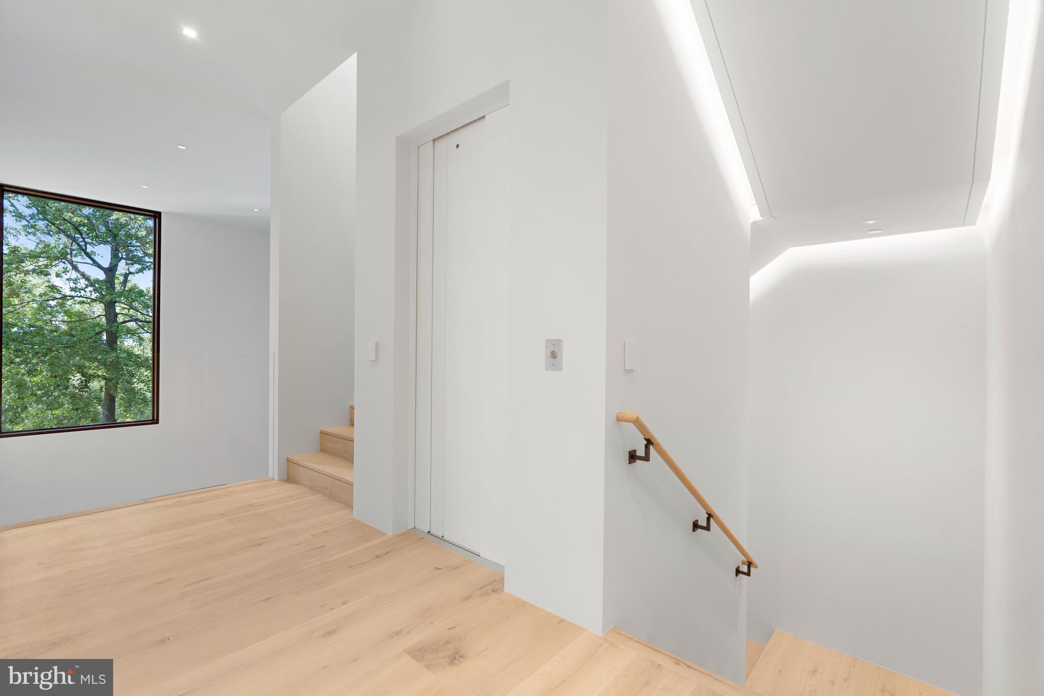 3131 Chain Bridge Road Northwest Washington, DC 20016 - Photo 45 of 54 a bedroom with a bed and a window