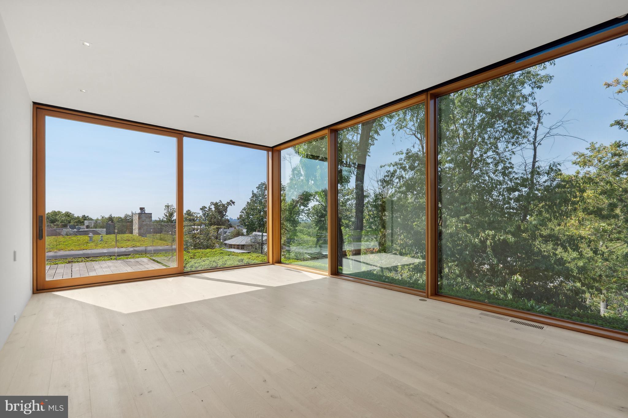 3131 Chain Bridge Road Northwest Washington, DC 20016 - Photo 50 of 54 a view of an outdoor space with a big yard