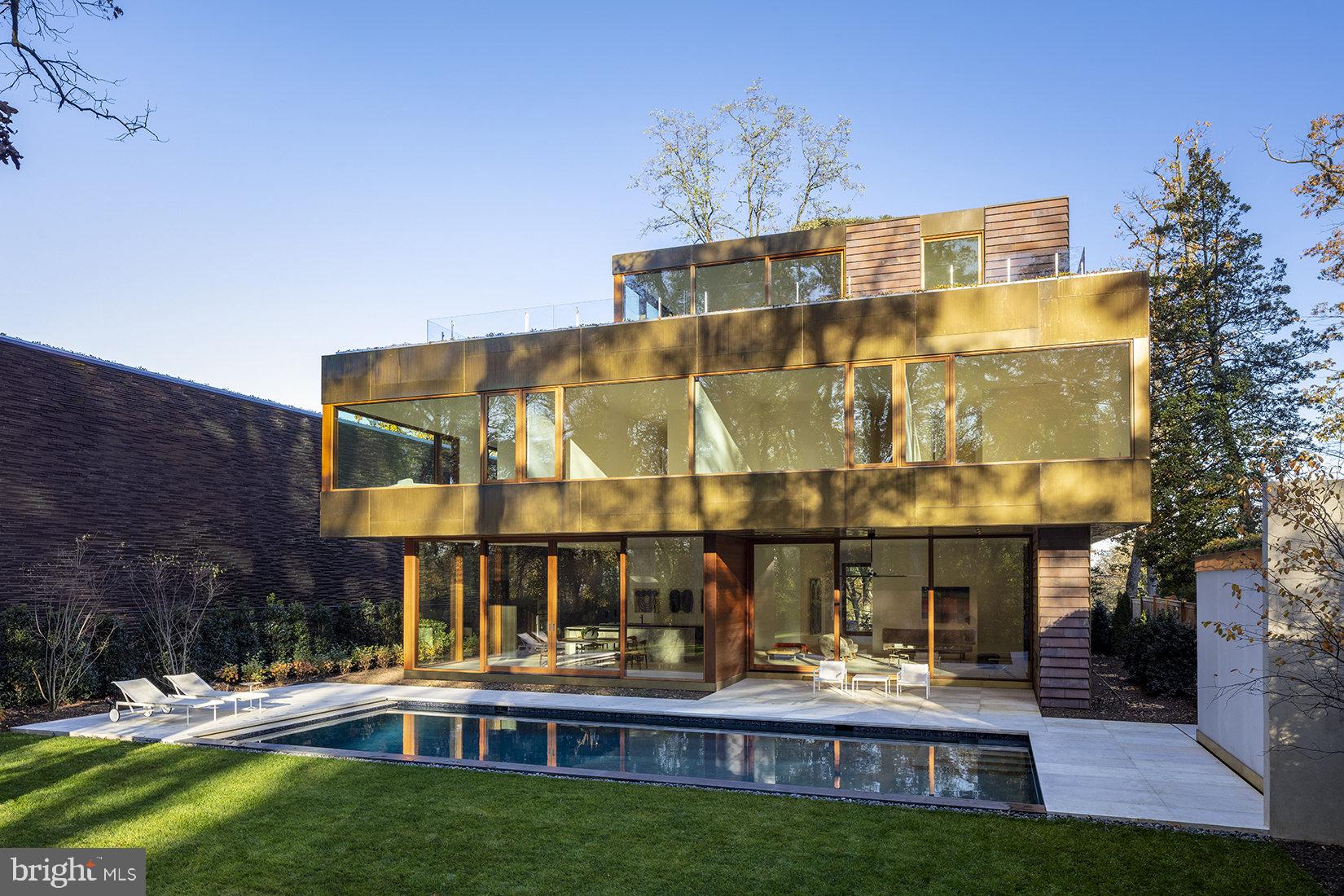 3131 Chain Bridge Road Northwest Washington, DC 20016 - Photo 5 of 54 a view of a building with a swimming pool