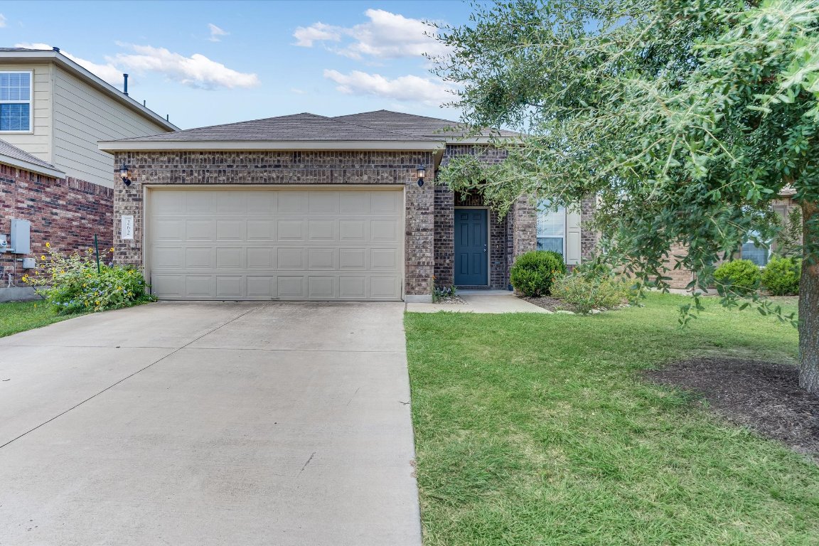 Martha Dr is set on a quiet street with the kind of curb appeal that feels warm and inviting from the moment you arrive.