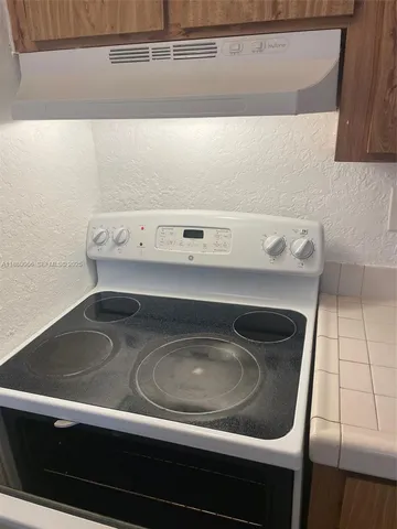 $1,440 | 2401 Riverside Drive, Unit 203B, Coral Springs, FL 33065