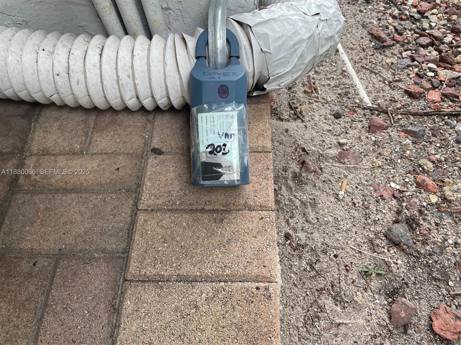 2401 Riverside Drive, Unit 203B Coral Springs, FL 33065 - Photo 38 of 38 Supra Next to the Building Mailbox.