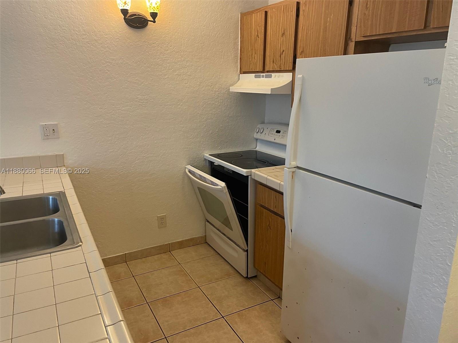 2401 Riverside Drive, Unit 203B Coral Springs, FL 33065 - Photo 9 of 38