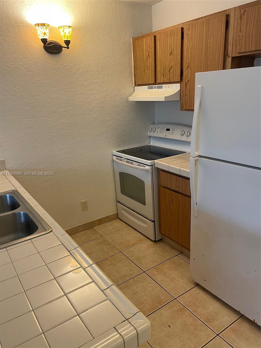 2401 Riverside Drive, Unit 203B Coral Springs, FL 33065 - Photo 10 of 38