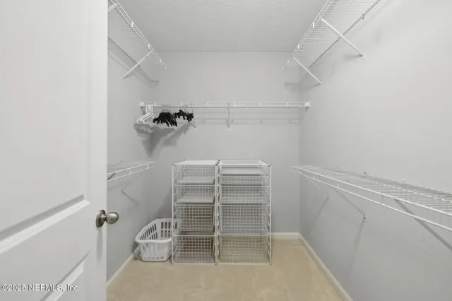 a bathroom with a shower sink and mirror