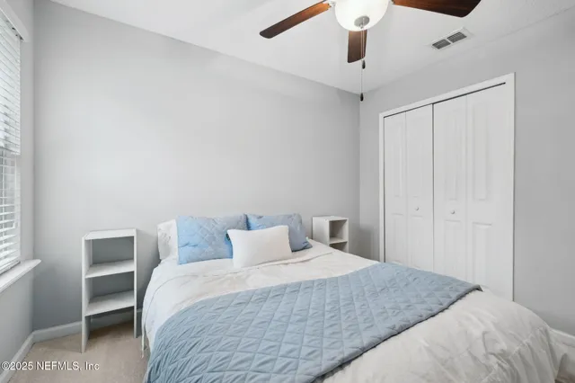 a view of a hallway with washer and dryer