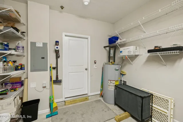 a view of a balcony with chairs and a stove