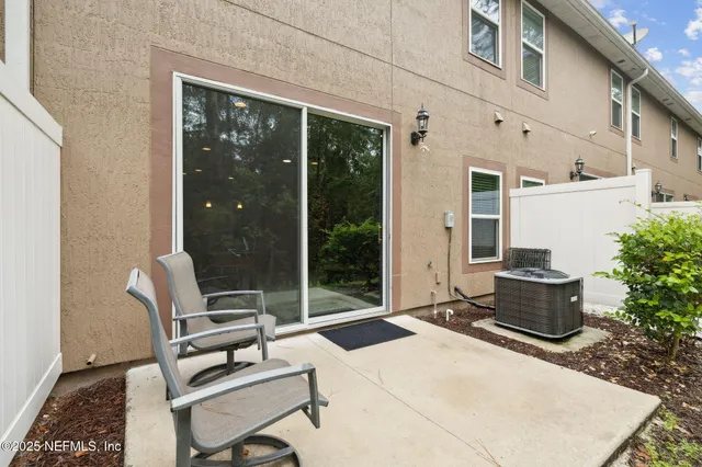 a view of a house with a back yard