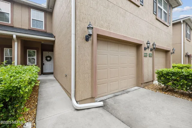 front view of a house with a small yard