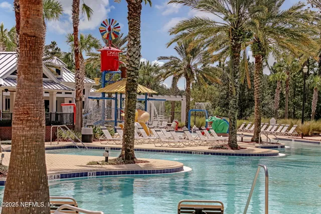 a view of a golf course with a lake