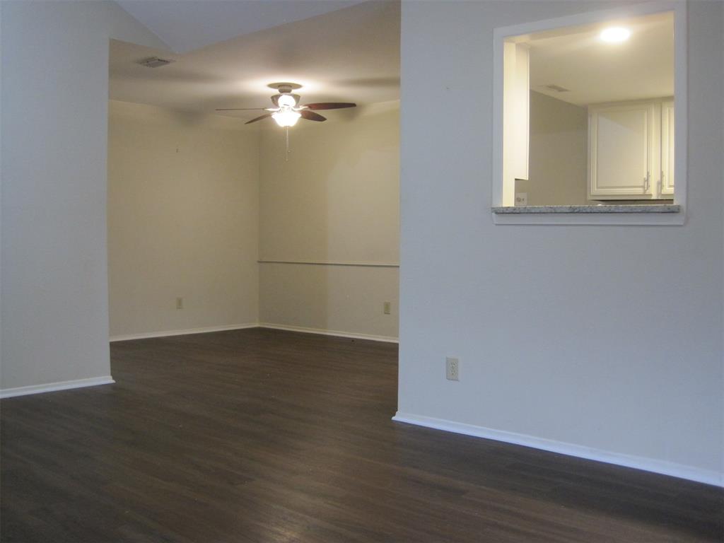 6478 Argo Street Dallas, TX 75214 - Photo 4 of 15 a view of a room with wooden floor and fan