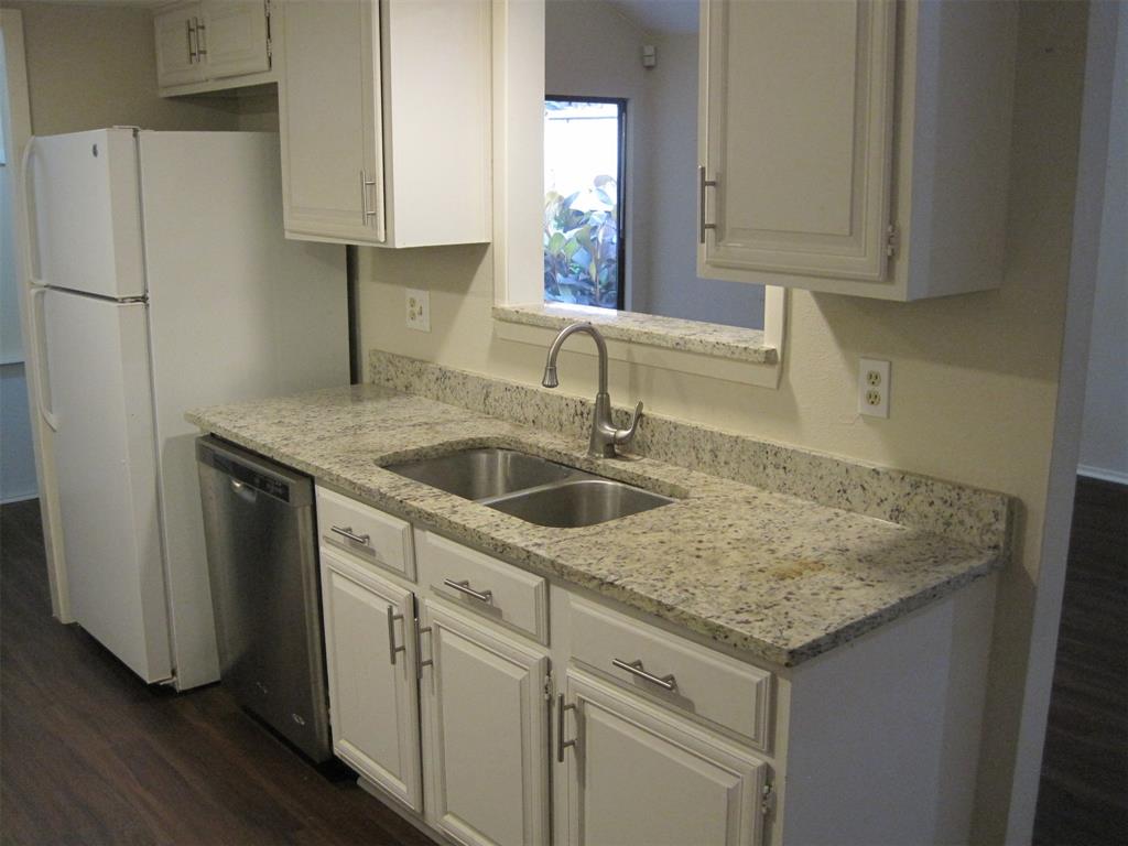 6478 Argo Street Dallas, TX 75214 - Photo 5 of 15 a kitchen with sink cabinets and wooden floor