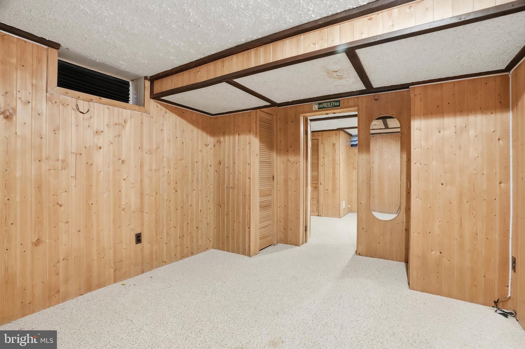 1909 Pagham Road Glen Burnie, MD 21061 - Photo 24 of 30 a bedroom with a white bed and a shower