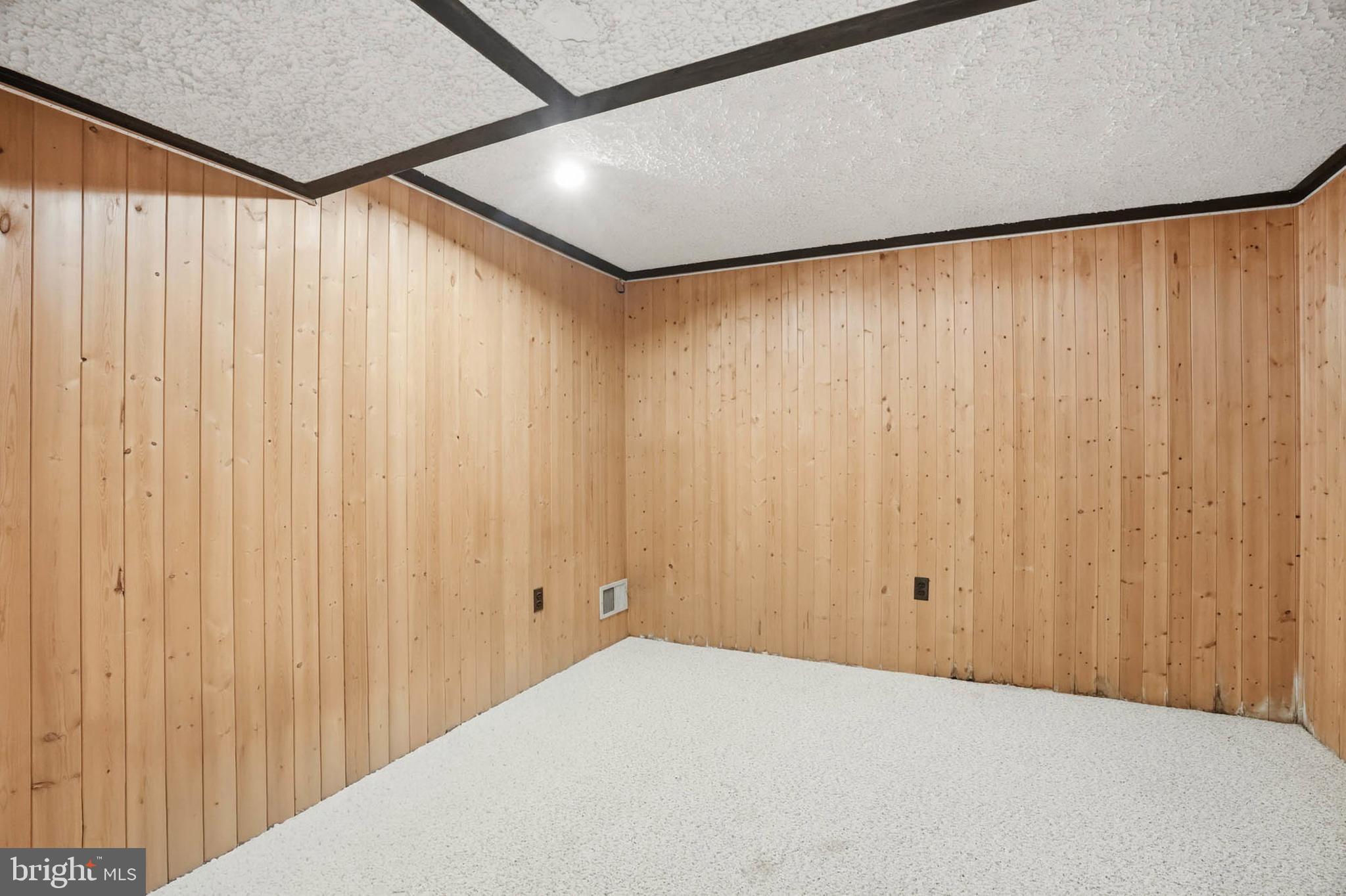 1909 Pagham Road Glen Burnie, MD 21061 - Photo 25 of 30 a view of a big room with a wooden door