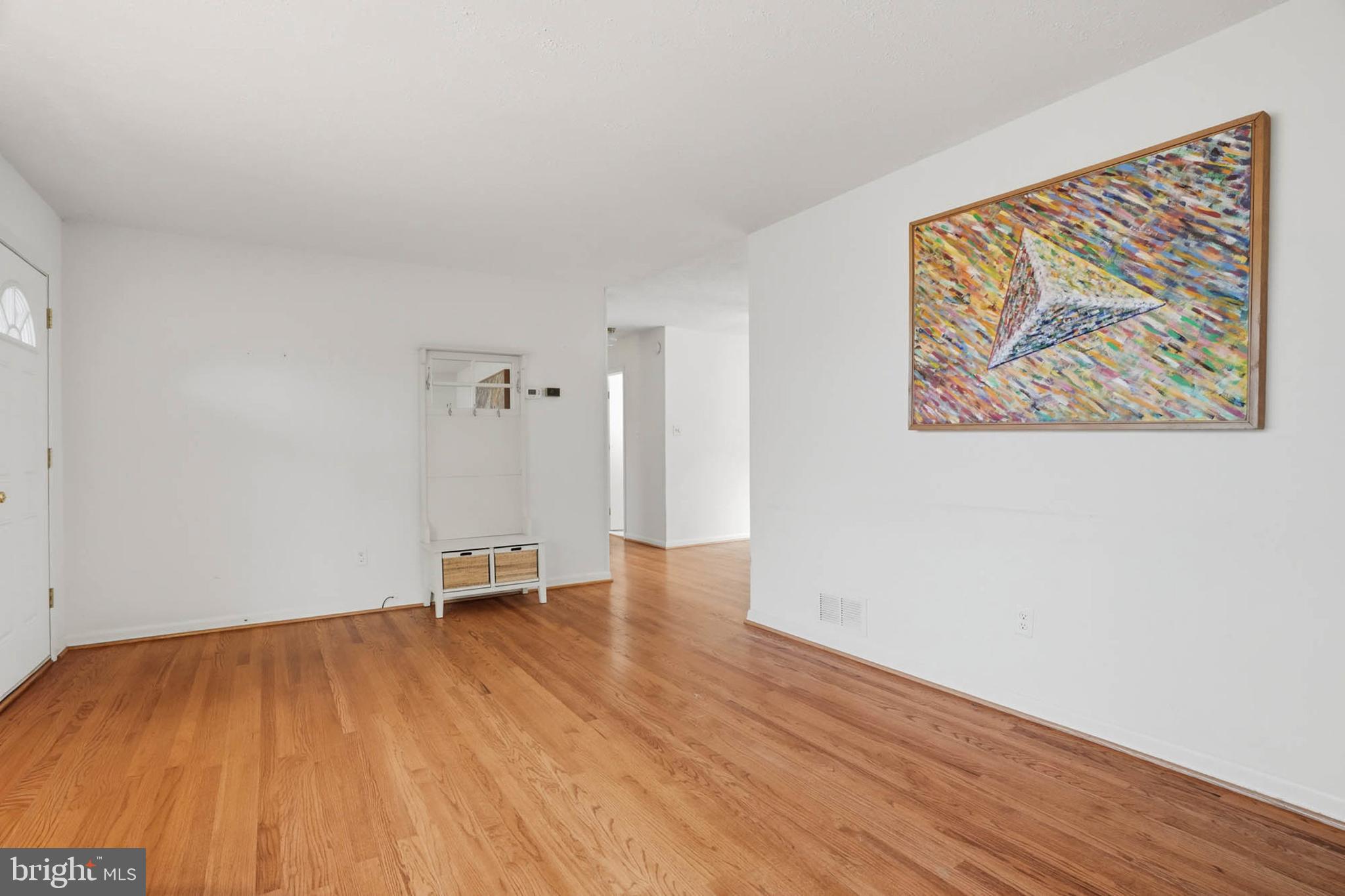 1909 Pagham Road Glen Burnie, MD 21061 - Photo 6 of 30 a view of room with wooden floor