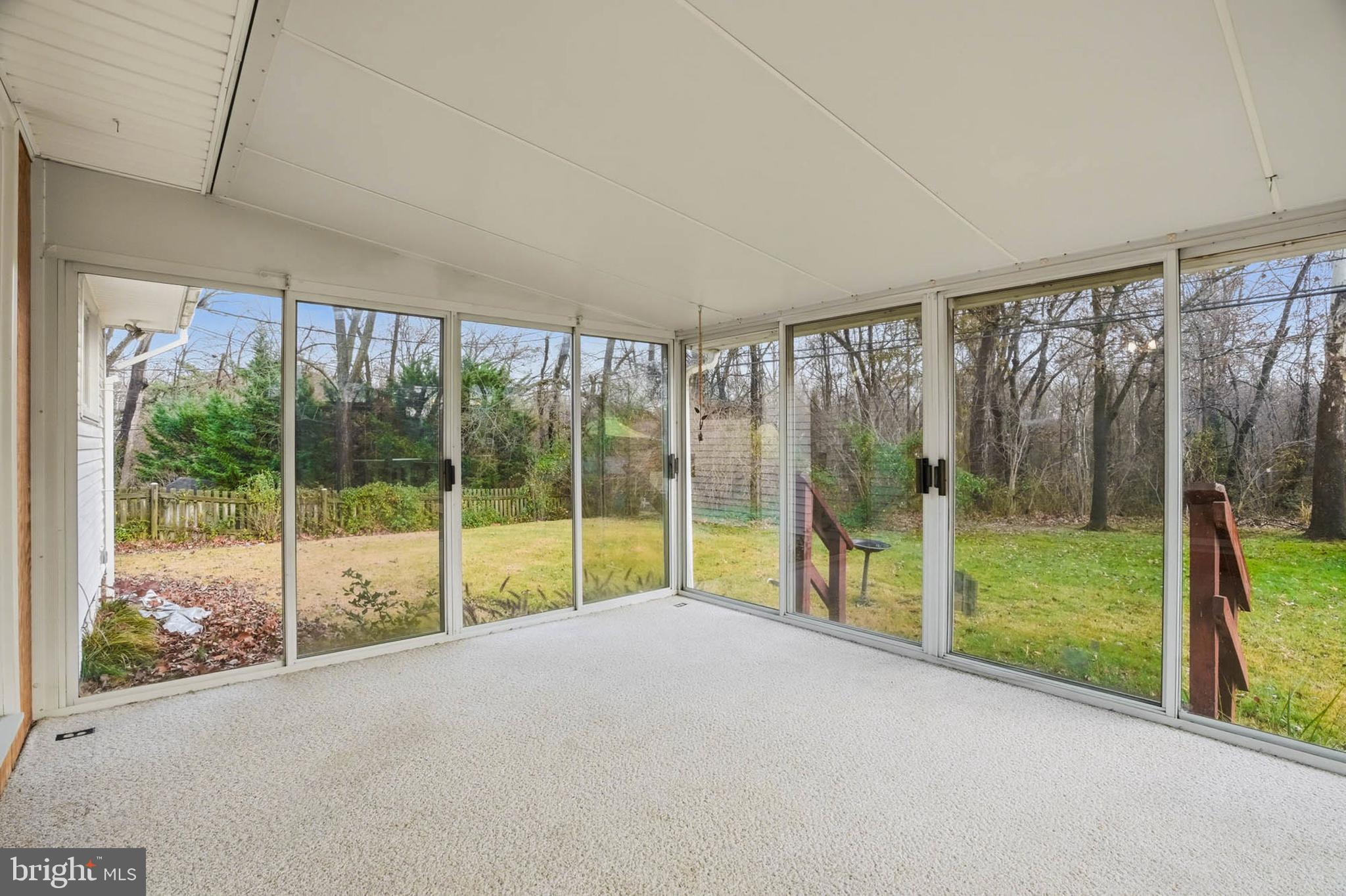 1909 Pagham Road Glen Burnie, MD 21061 - Photo 8 of 30 a view of an empty room with glass windows