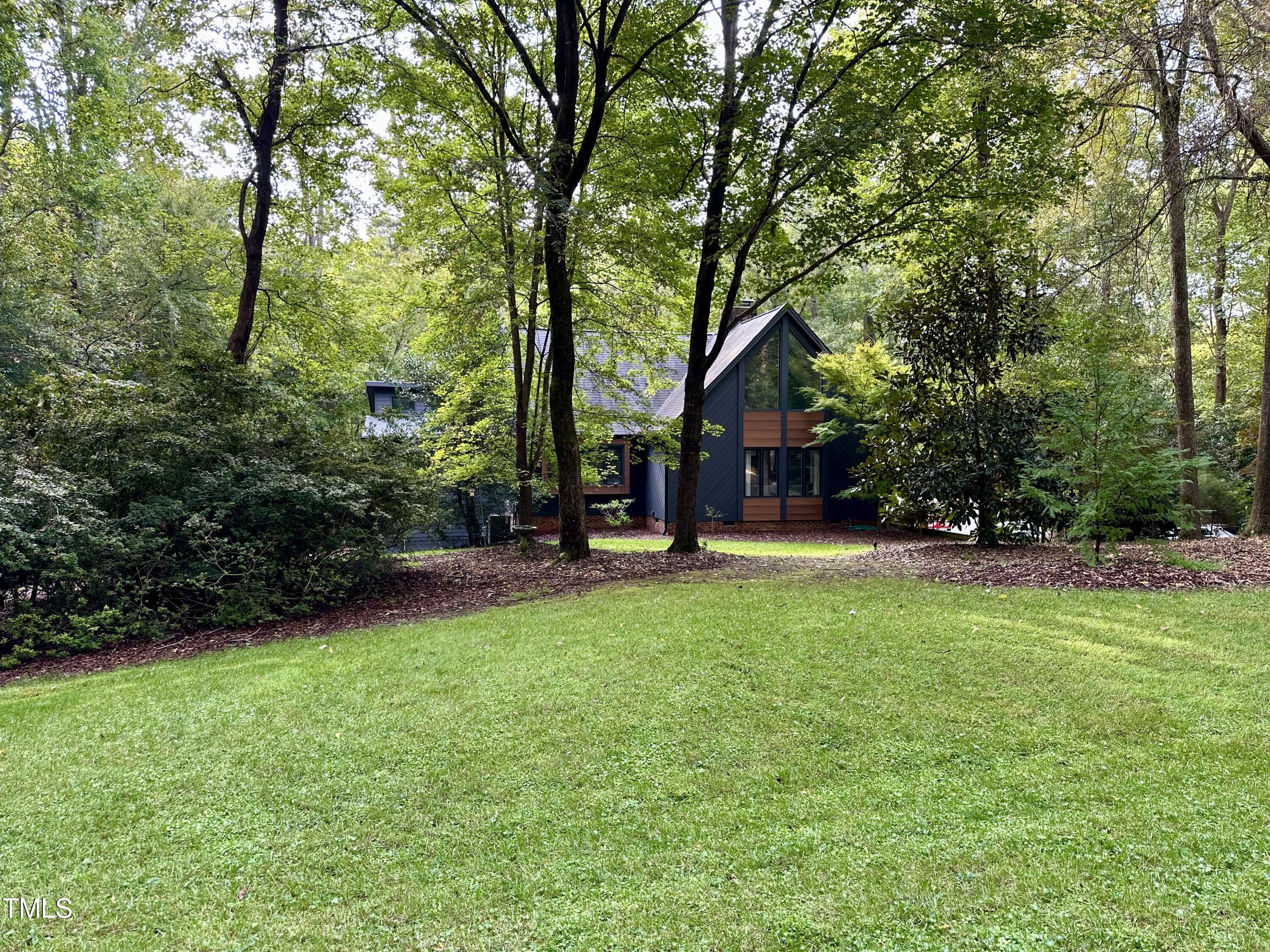 11904 Deer Run Raleigh, NC 27614 - Photo 1 of 61 a view of a house with backyard and a tree