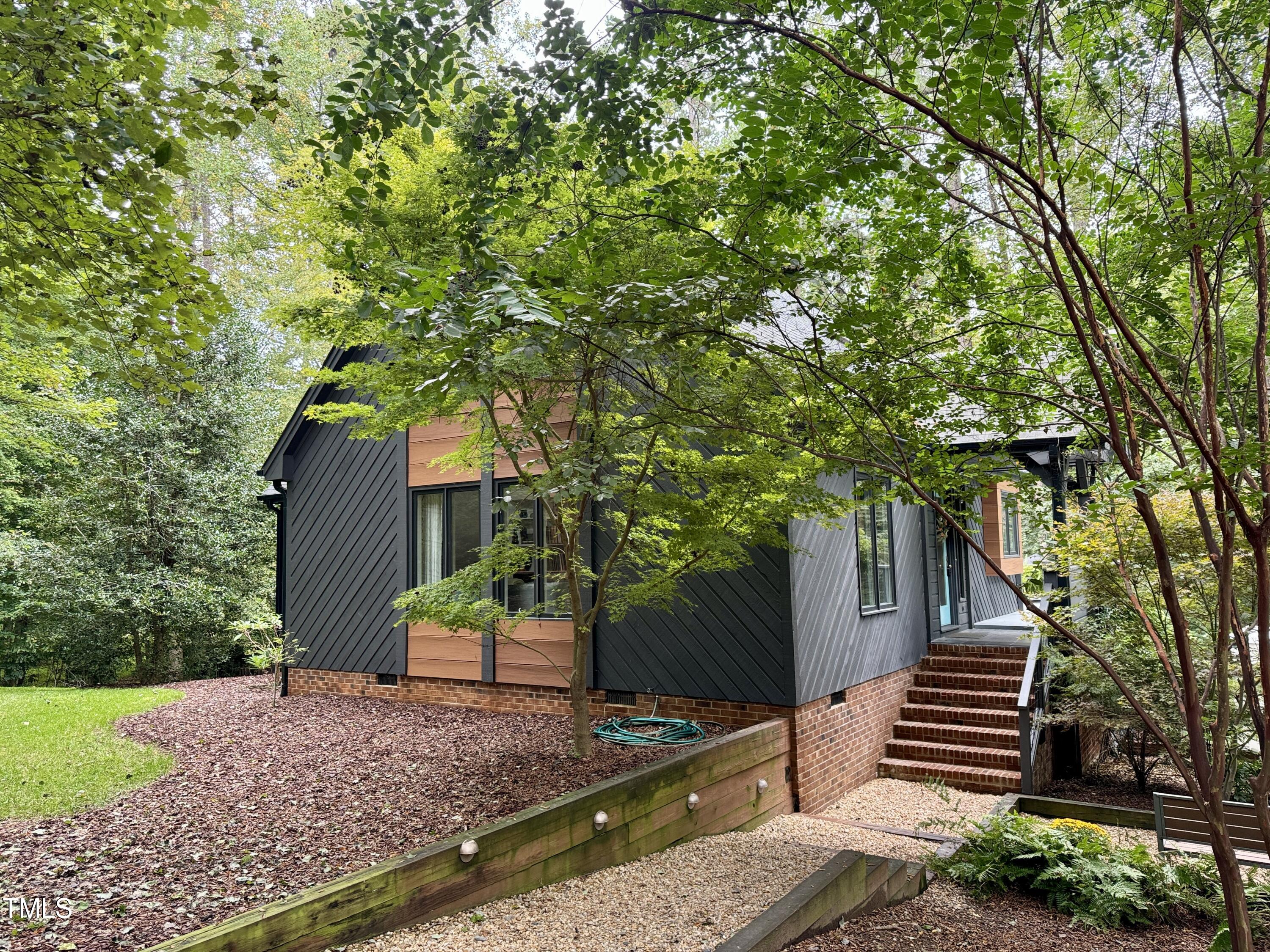 11904 Deer Run Raleigh, NC 27614 - Photo 2 of 61 a view of a house with a yard