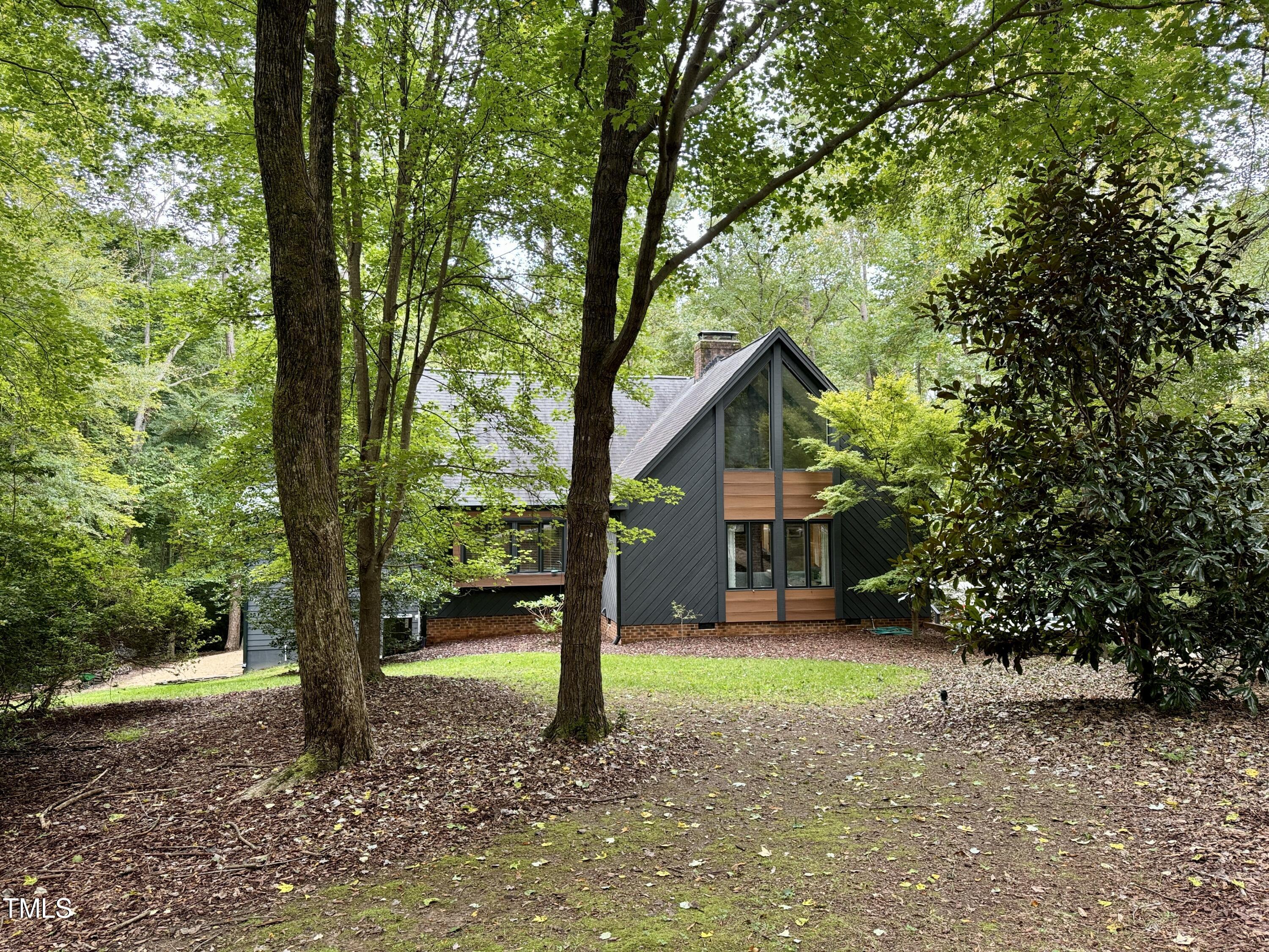 11904 Deer Run Raleigh, NC 27614 - Photo 3 of 61 a front view of a house with garden