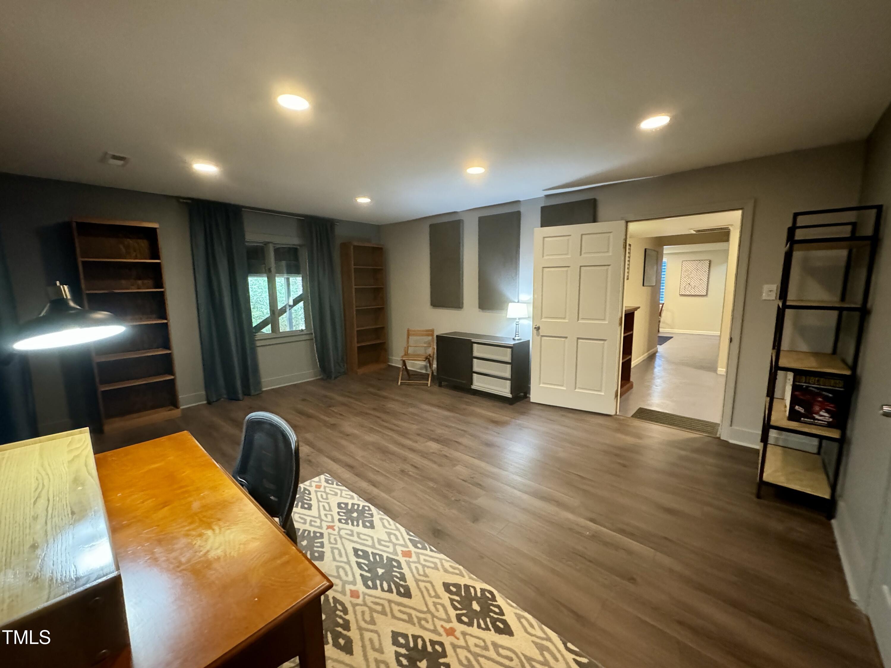 11904 Deer Run Raleigh, NC 27614 - Photo 34 of 61 a view of a livingroom with furniture and wooden floor
