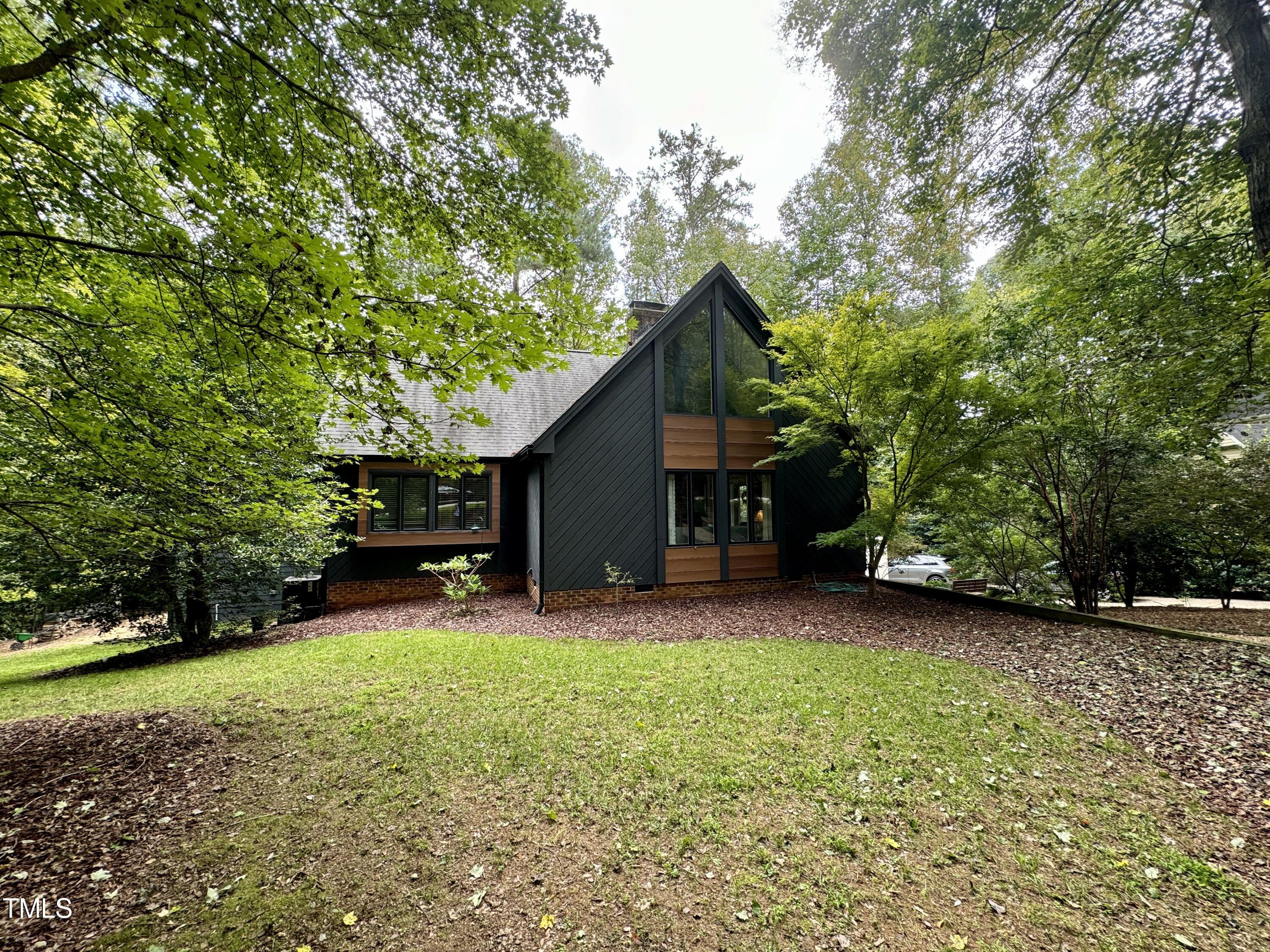 11904 Deer Run Raleigh, NC 27614 - Photo 44 of 61 a view of a house with a yard
