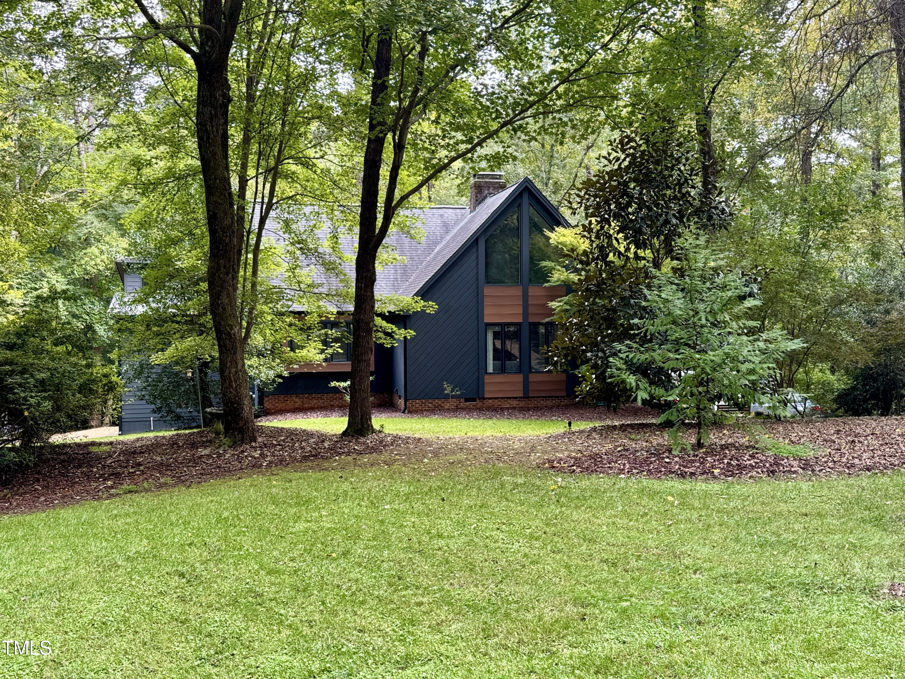 11904 Deer Run Raleigh, NC 27614 - Photo 45 of 61 front view of a house with a yard