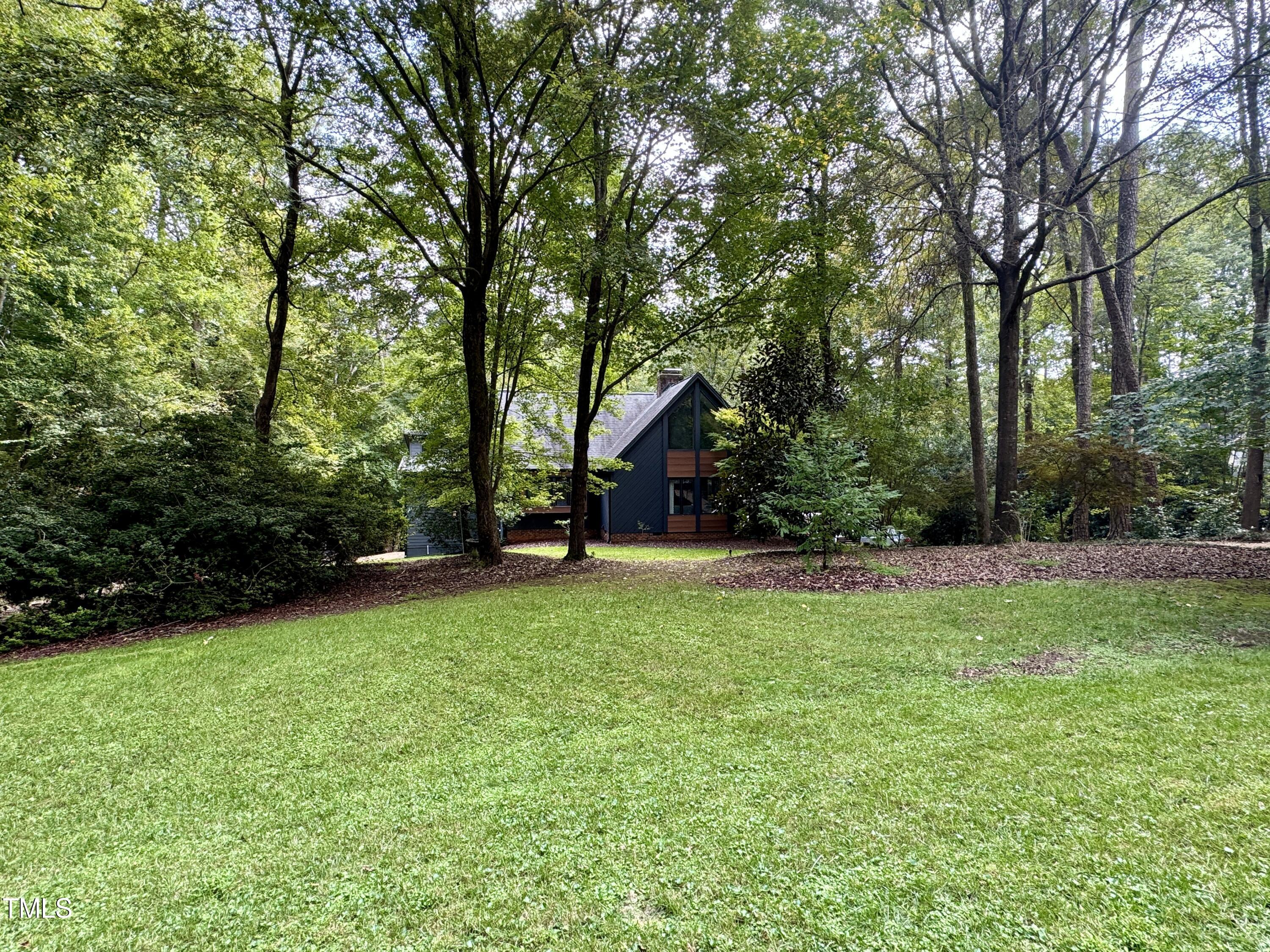 11904 Deer Run Raleigh, NC 27614 - Photo 58 of 61 a view of a house with backyard and sitting area