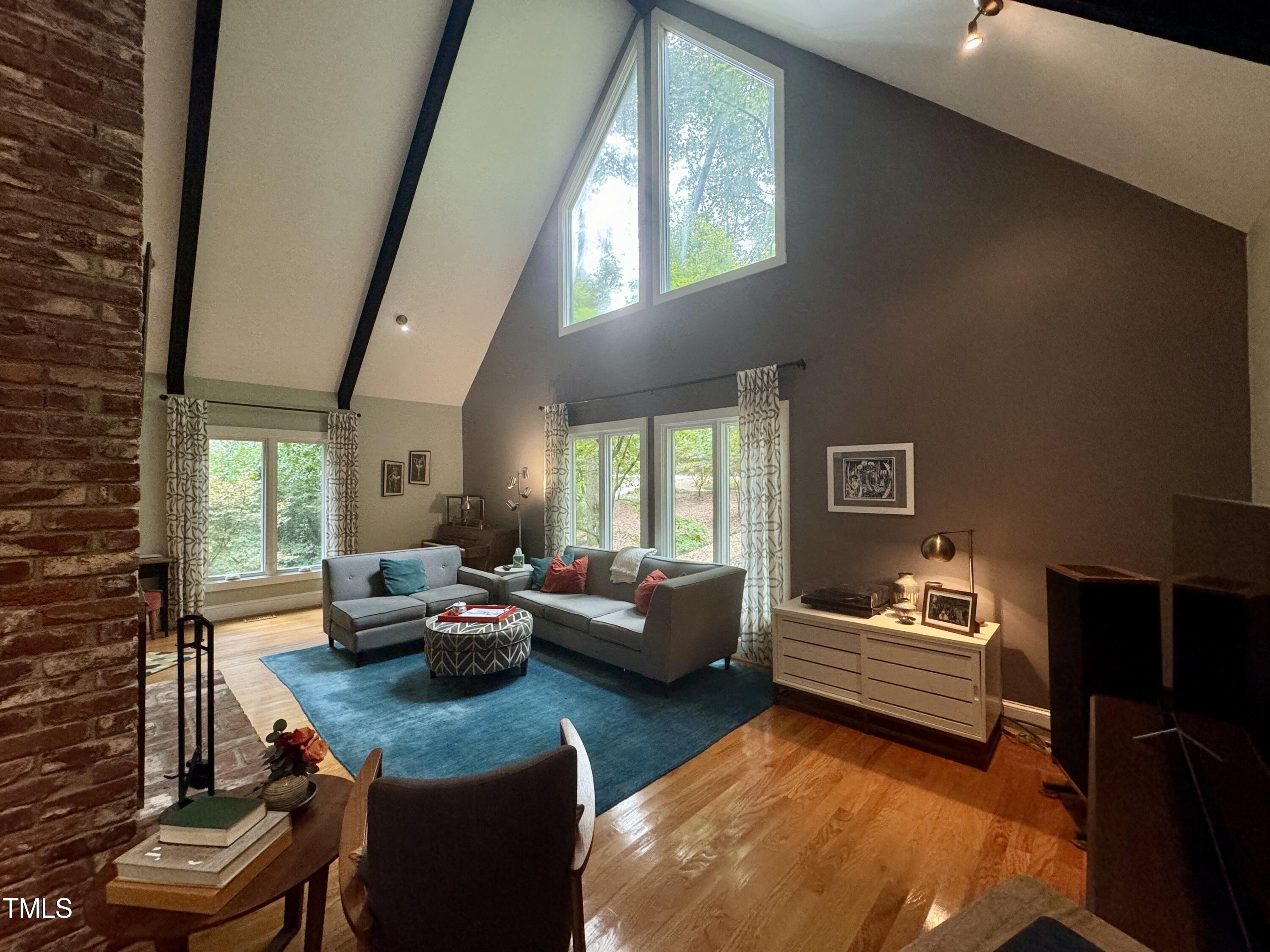 11904 Deer Run Raleigh, NC 27614 - Photo 6 of 61 a living room with furniture and a large window