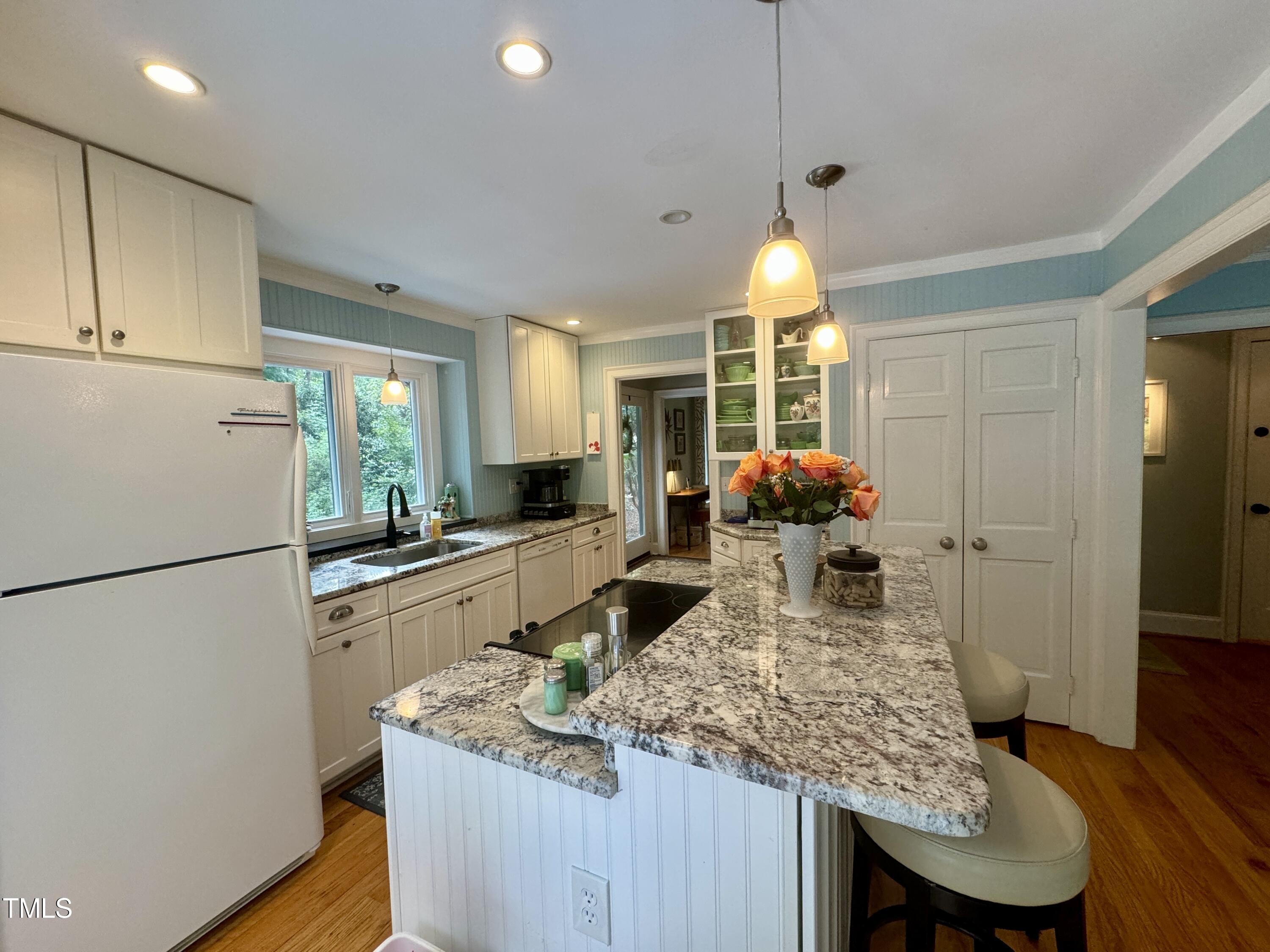 11904 Deer Run Raleigh, NC 27614 - Photo 7 of 61 a kitchen with stainless steel appliances granite countertop a sink stove and refrigerator