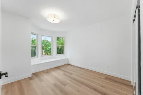 an empty room with a window