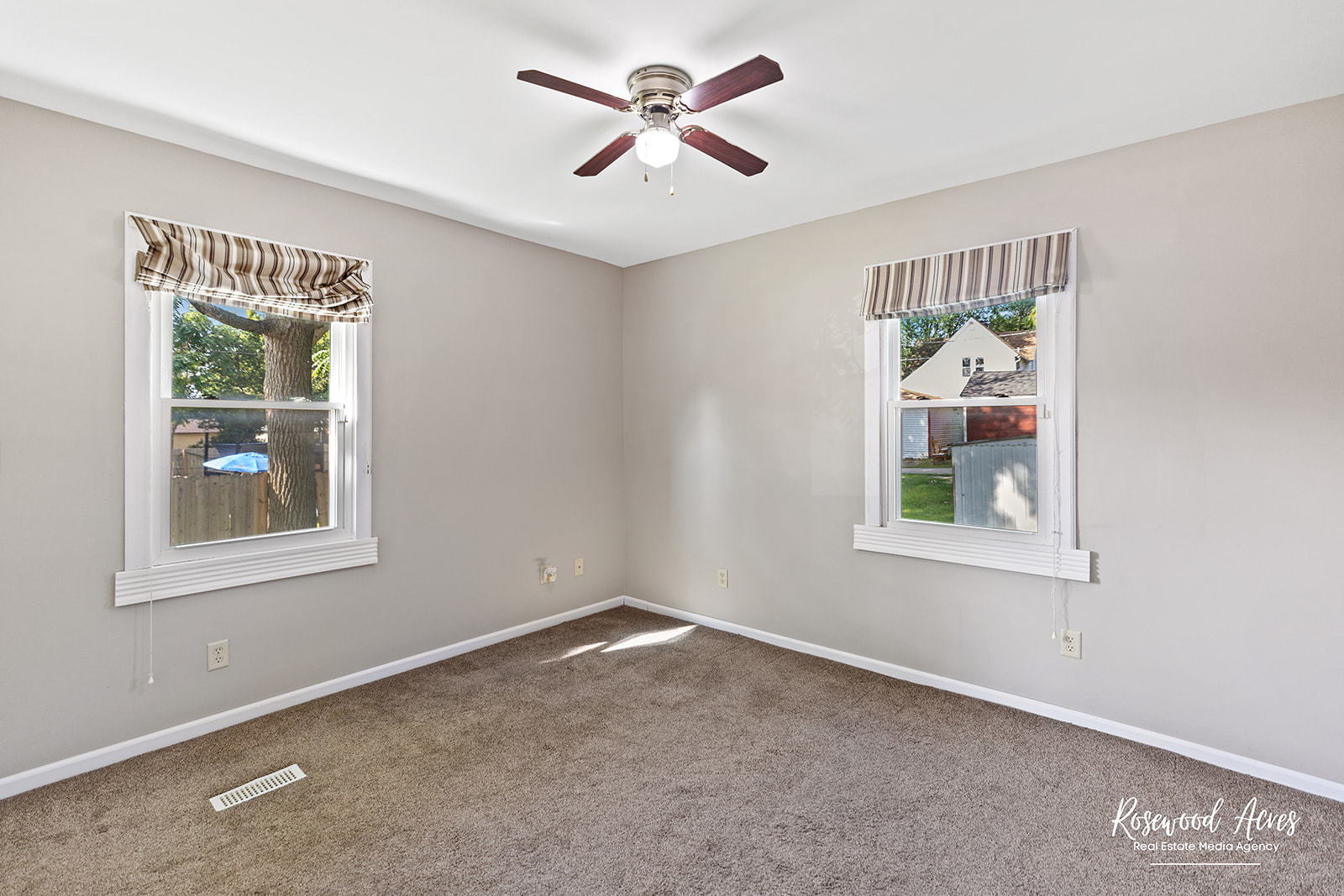 345 North 5th Avenue Kankakee, IL 60901 - Photo 11 of 22 an empty room with windows and fan