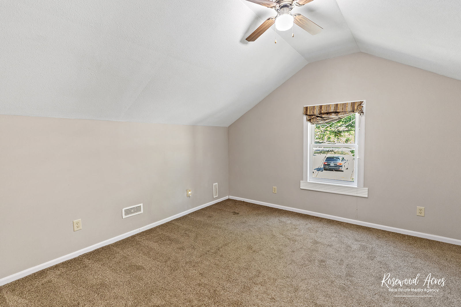 345 North 5th Avenue Kankakee, IL 60901 - Photo 14 of 22 an empty room with a window and a fan
