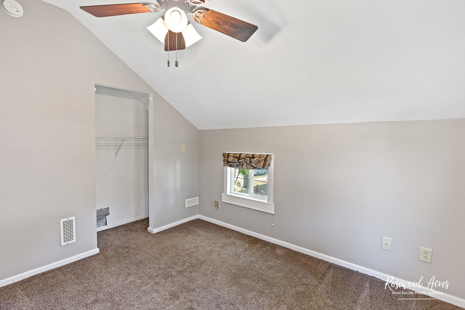 345 North 5th Avenue Kankakee, IL 60901 - Photo 18 of 22 an empty room with windows and fan