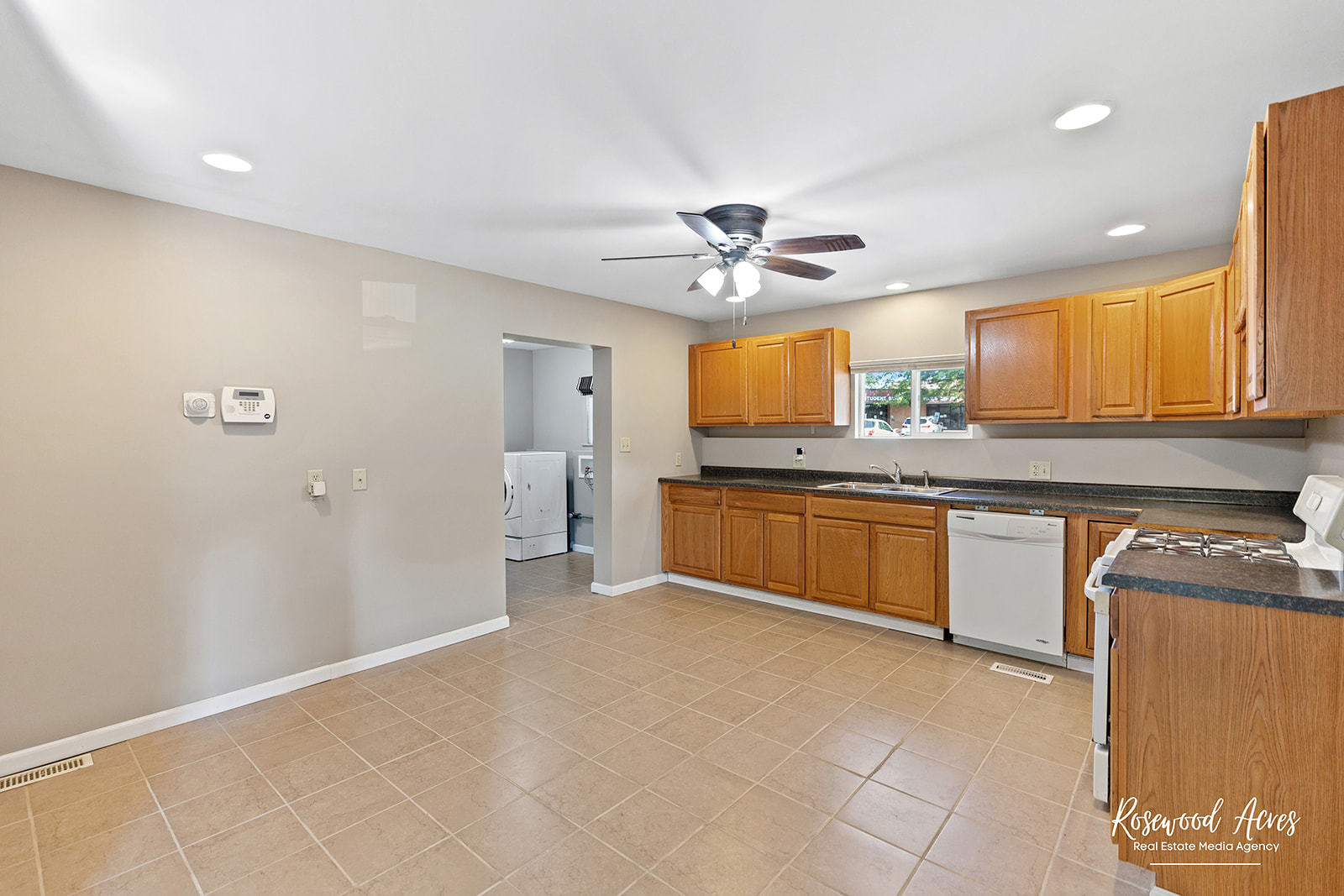 345 North 5th Avenue Kankakee, IL 60901 - Photo 6 of 22 a large kitchen with stainless steel appliances granite countertop a stove a sink dishwasher and a refrigerator