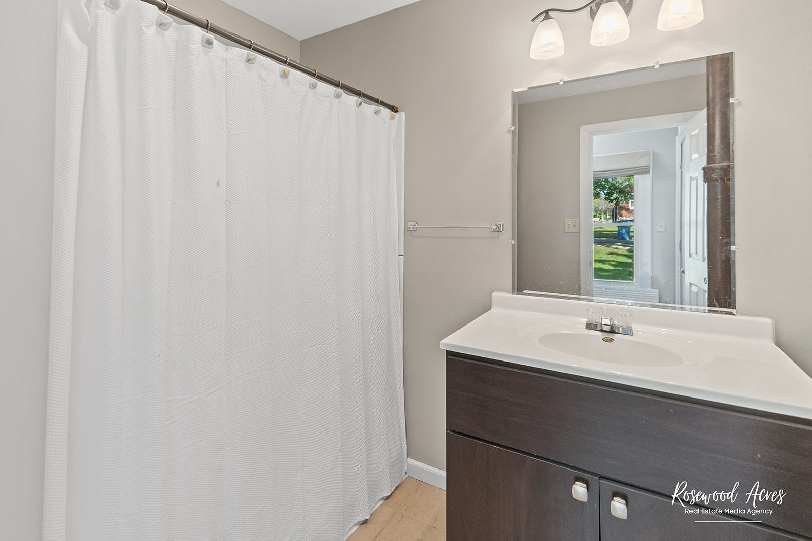 345 North 5th Avenue Kankakee, IL 60901 - Photo 9 of 22 a sink and a mirror