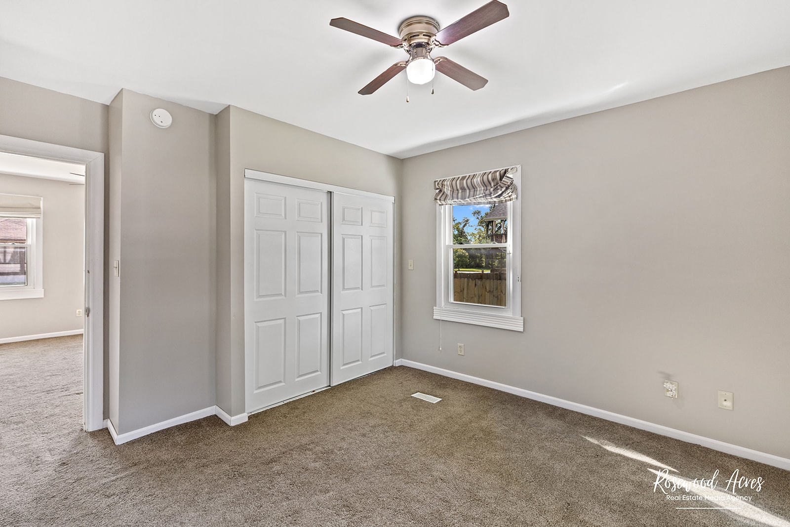 345 North 5th Avenue Kankakee, IL 60901 - Photo 10 of 22 a view of a livingroom with a ceiling fan and window