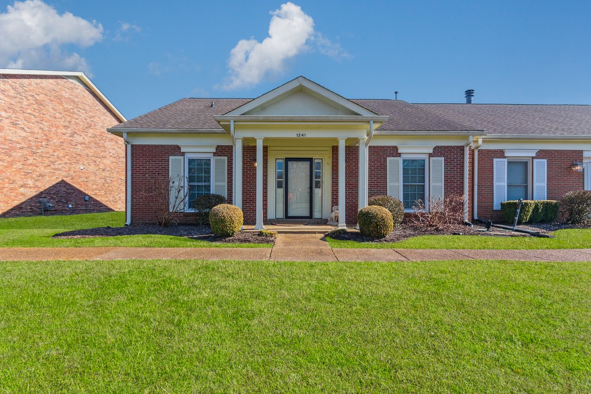 1241 General George Patton Road Nashville, TN 37221 - Photo 1 of 23 a view of a house with backyard and porch