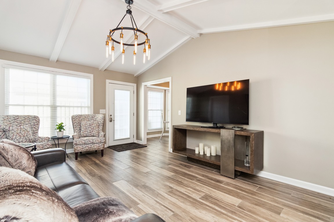 1241 General George Patton Road Nashville, TN 37221 - Photo 3 of 23 a living room with furniture and a flat screen tv