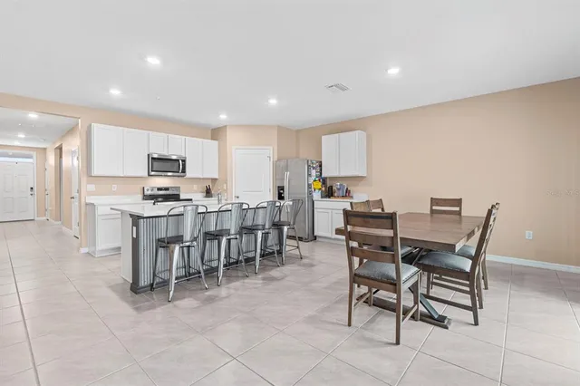 a view of a dining room with furniture
