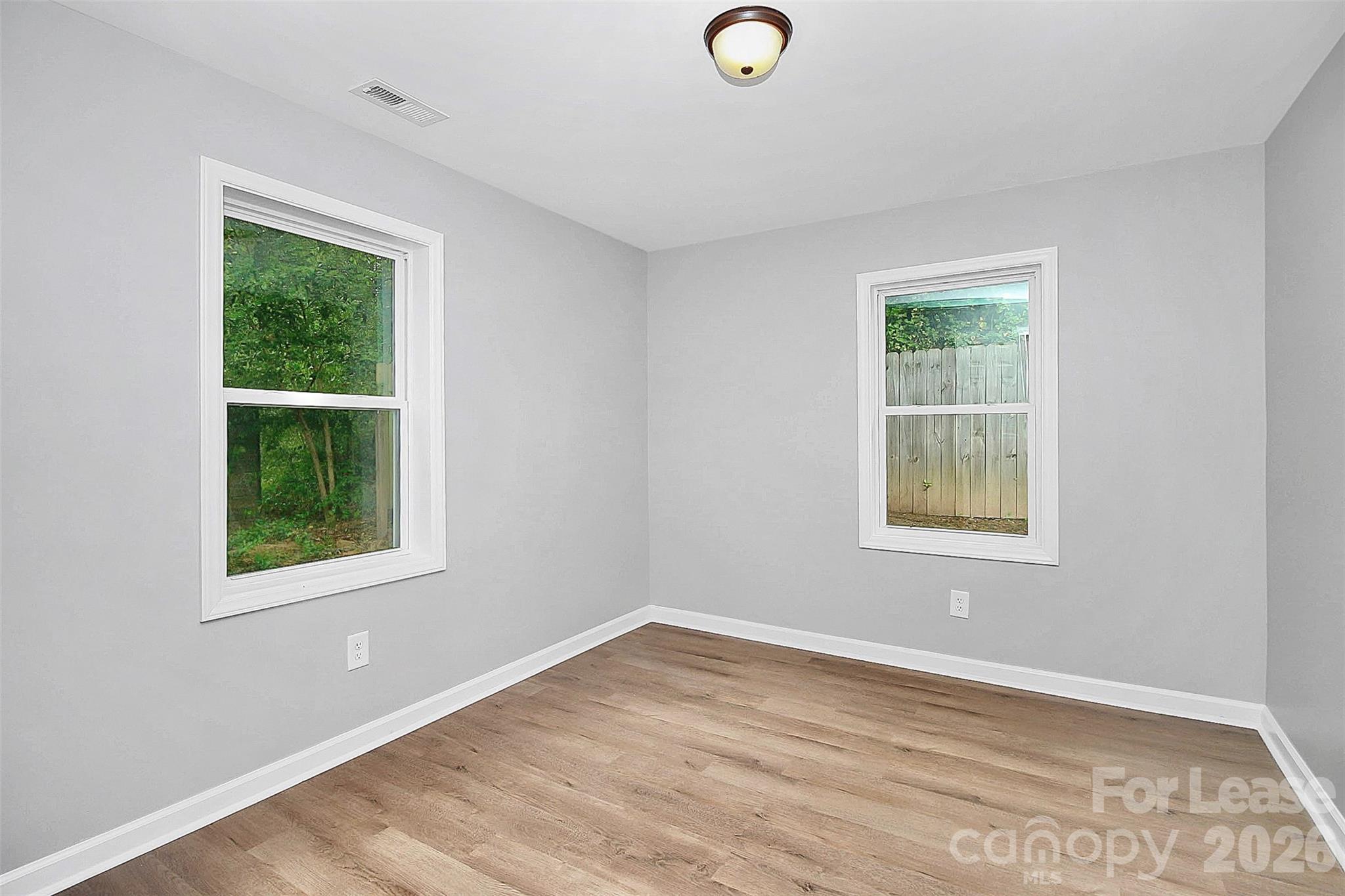 315 South Ransom Street Gastonia, NC 28052 - Photo 15 of 18 an empty room with a window