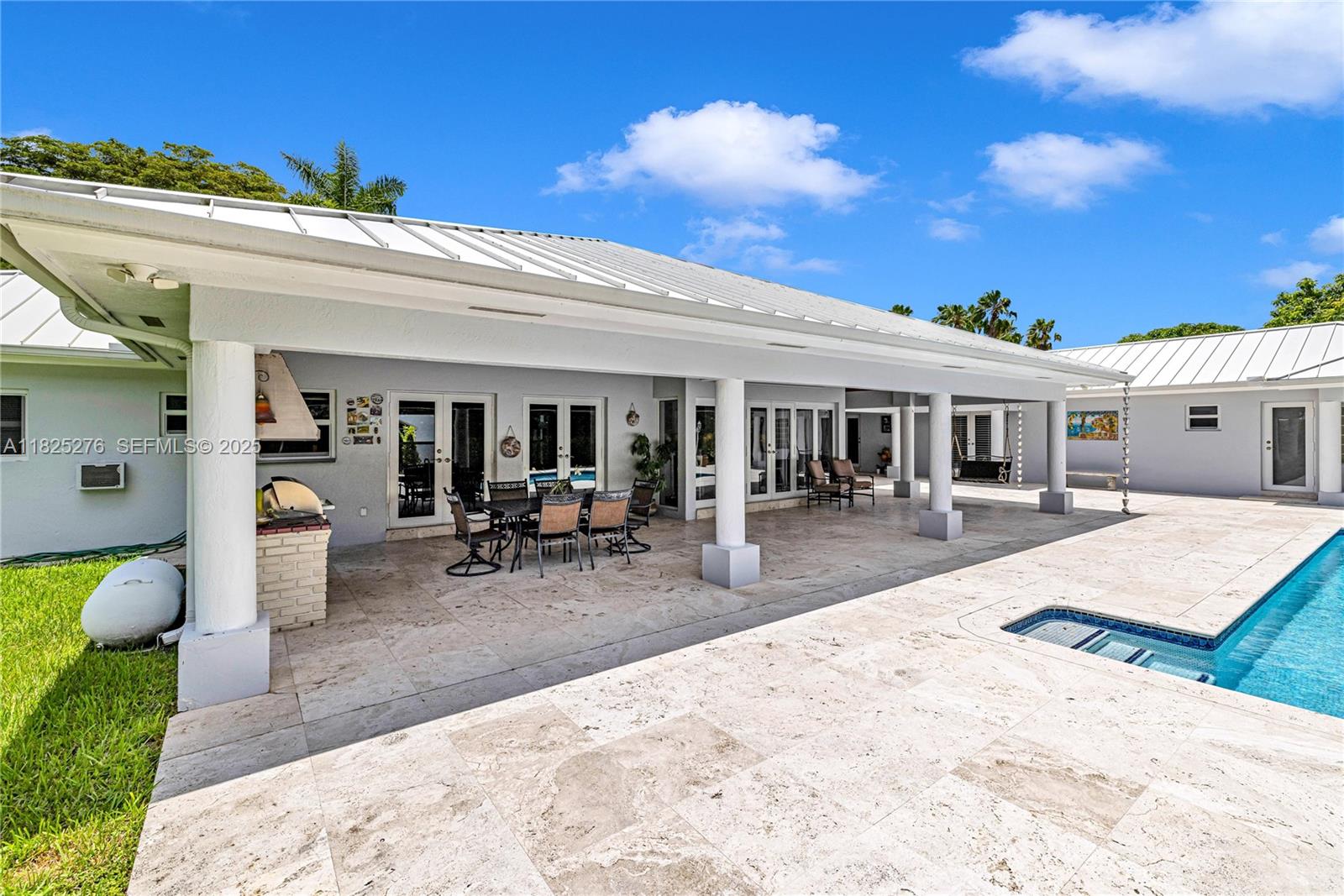 10563 Southwest 92nd Avenue Miami, FL 33176 - Photo 18 of 87 a view of a house with backyard porch and sitting area