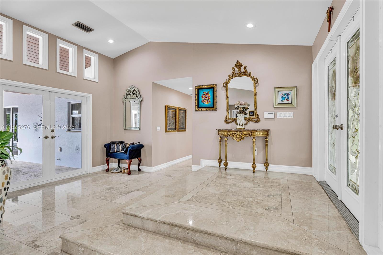 10563 Southwest 92nd Avenue Miami, FL 33176 - Photo 37 of 87 a view of a livingroom with table and chair