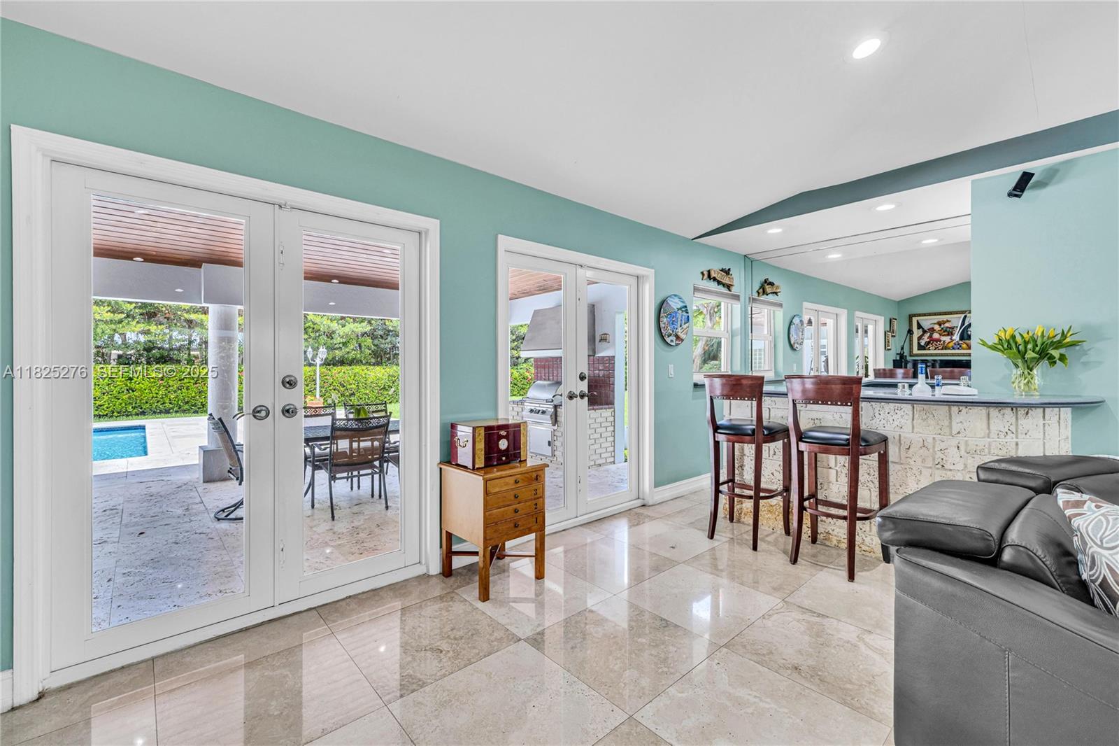 10563 Southwest 92nd Avenue Miami, FL 33176 - Photo 44 of 87 a dining room with furniture and a floor to ceiling window