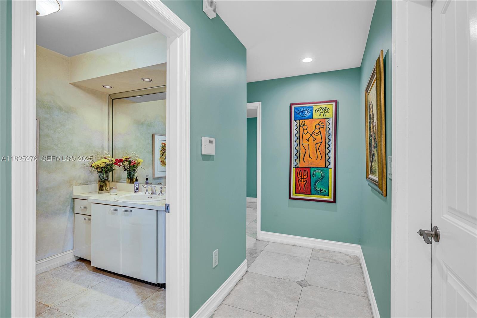 10563 Southwest 92nd Avenue Miami, FL 33176 - Photo 45 of 87 a en suite bathroom with a sink and a mirror