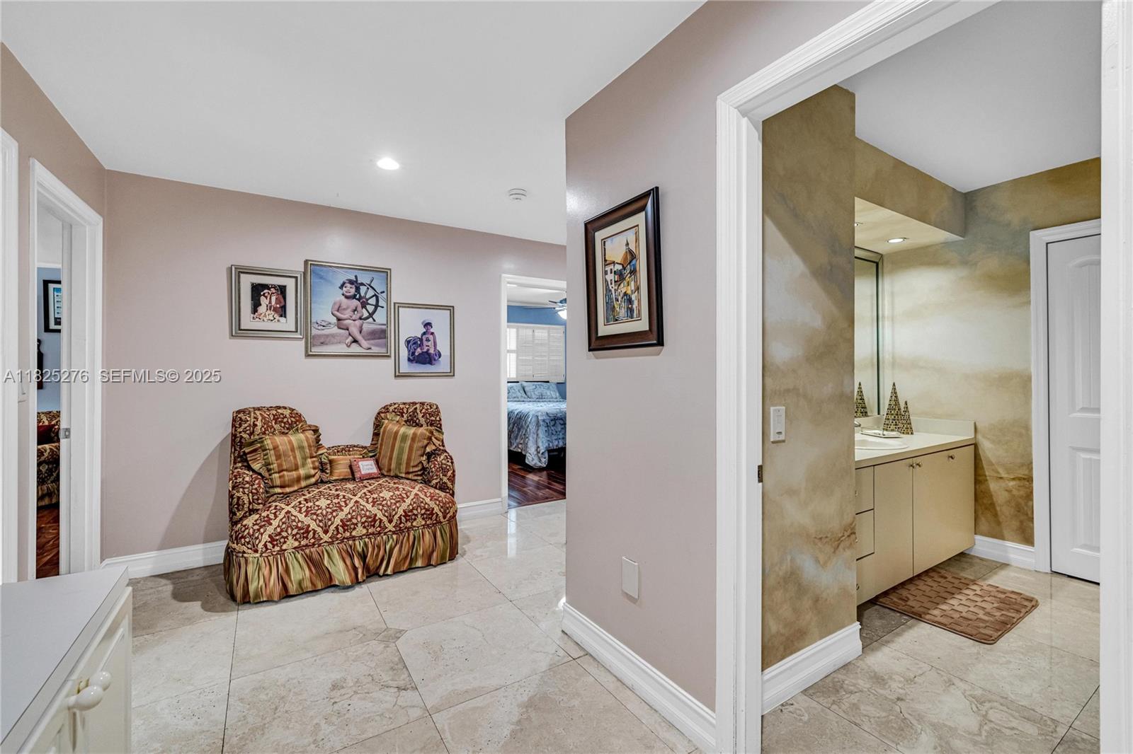 10563 Southwest 92nd Avenue Miami, FL 33176 - Photo 56 of 87 a spacious bedroom with a bed and bathroom