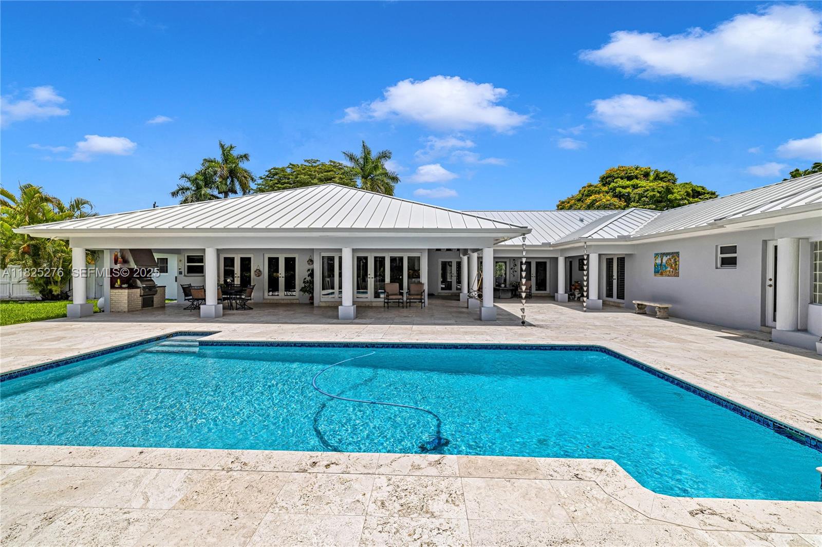 10563 Southwest 92nd Avenue Miami, FL 33176 - Photo 6 of 87 a view of a house with a swimming pool