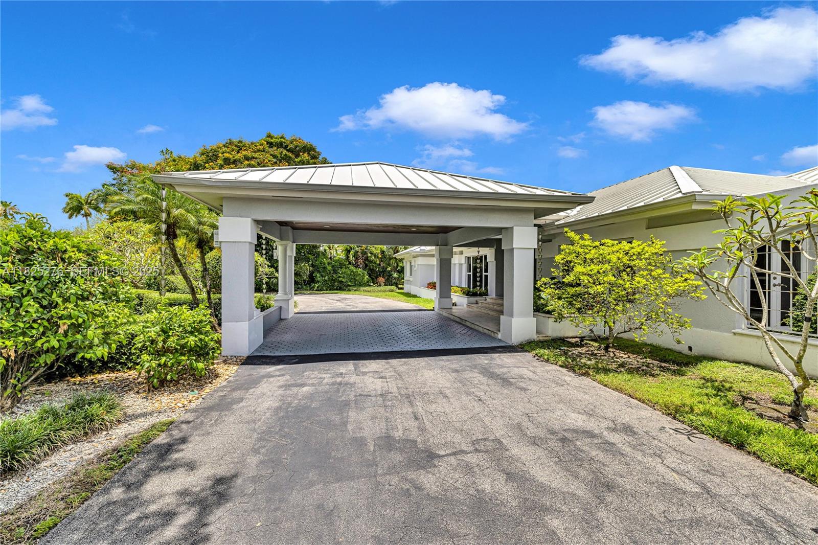 10563 Southwest 92nd Avenue Miami, FL 33176 - Photo 64 of 87 a view of a garden with a patio