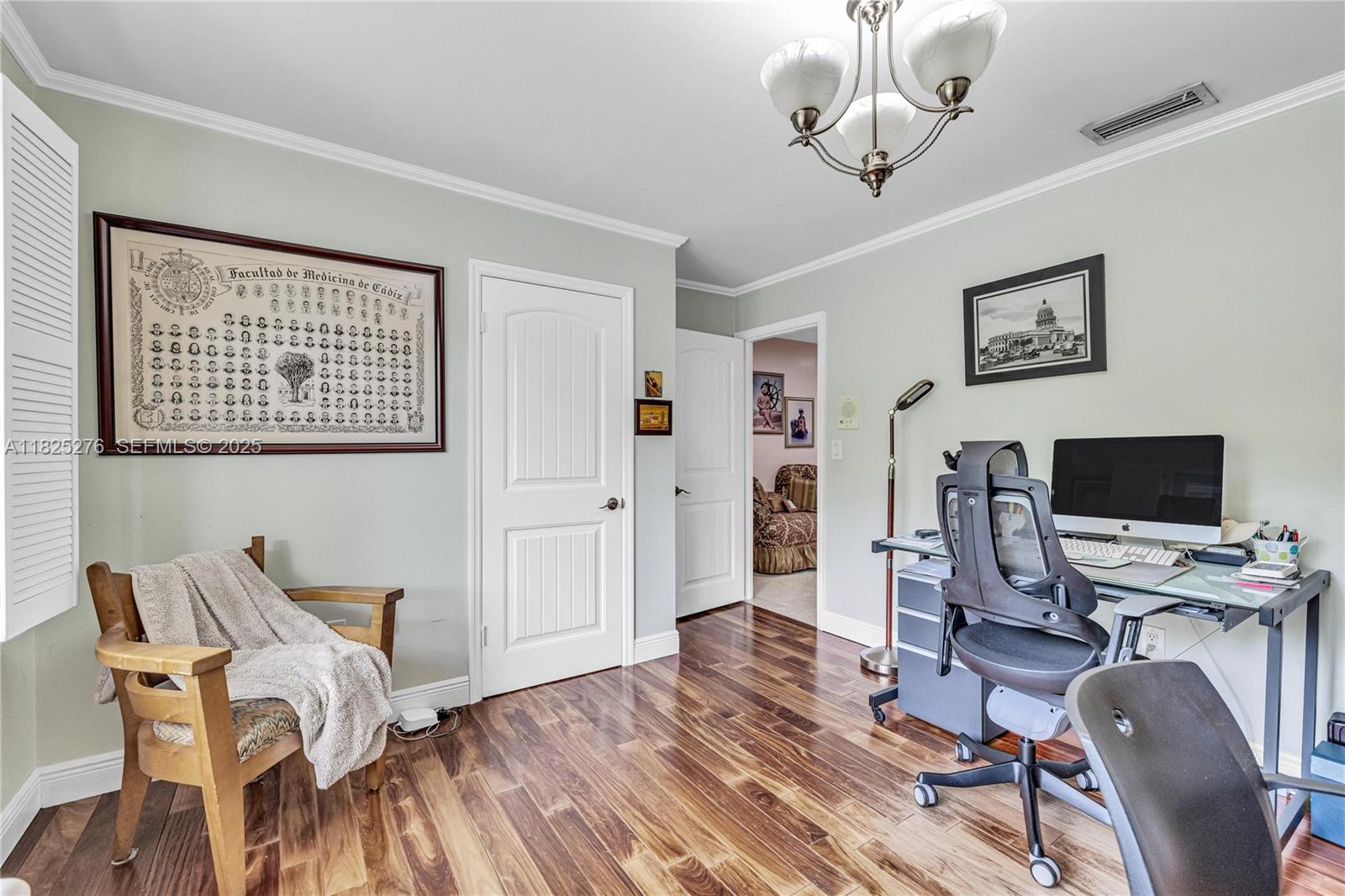 10563 Southwest 92nd Avenue Miami, FL 33176 - Photo 69 of 87 a view of a workspace with furniture and wooden floor