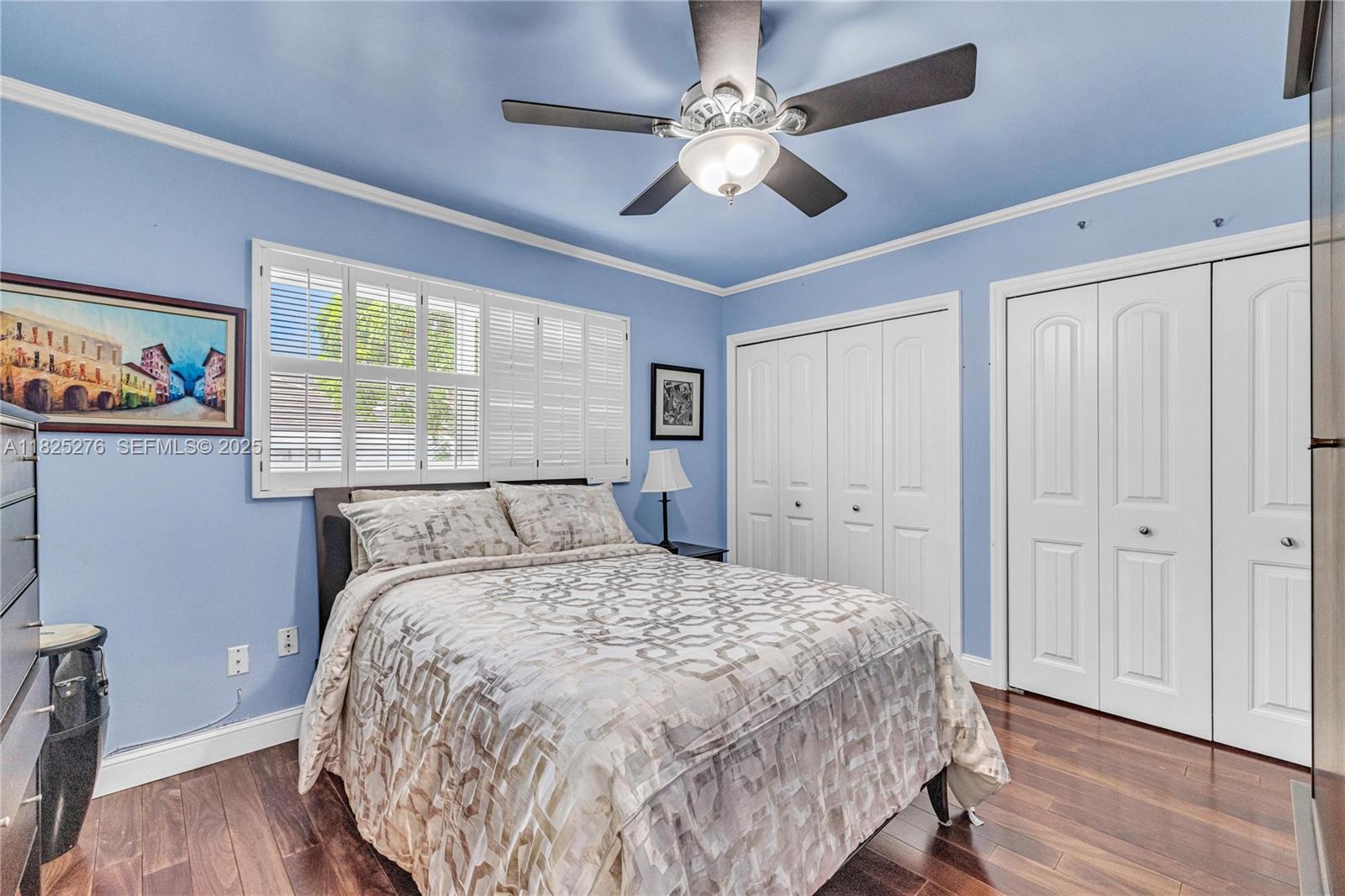 10563 Southwest 92nd Avenue Miami, FL 33176 - Photo 73 of 87 a bed sitting in a spacious bedroom next to a window