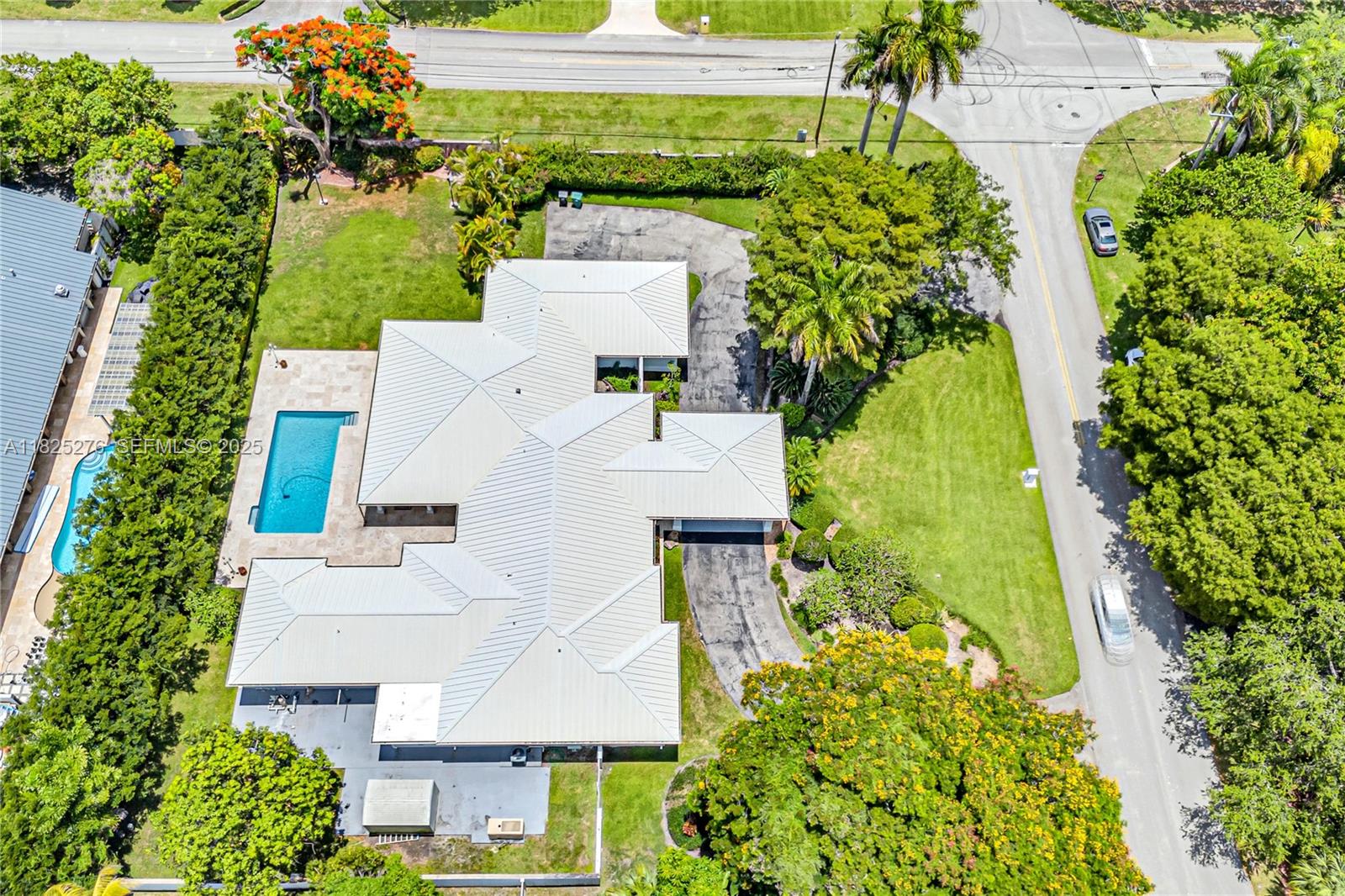 10563 Southwest 92nd Avenue Miami, FL 33176 - Photo 81 of 87 an aerial view of a house with a yard and garden